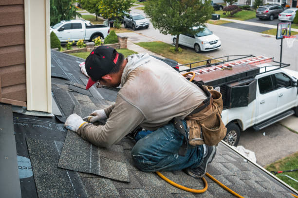 Professional Roofing technician working in Vermont, IL